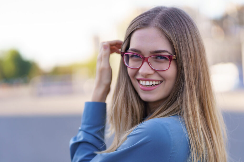 Portrait smiling woman in eyewear