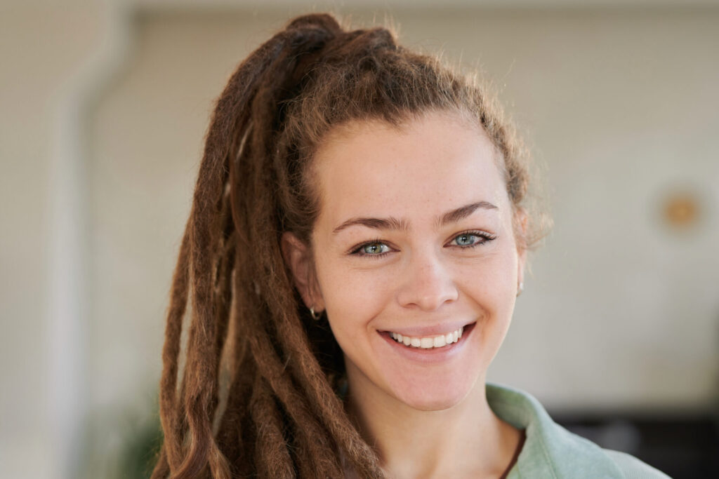 Smiling attractive girl with dreads